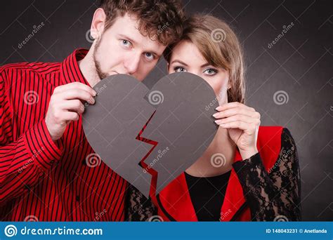 Sad Couple Holds Broken Heart Stock Image Image Of Sorrow Fight