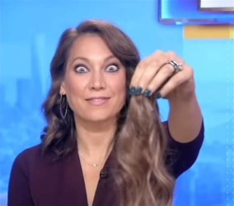 tv weather person ginger zee pulls out hair on live television