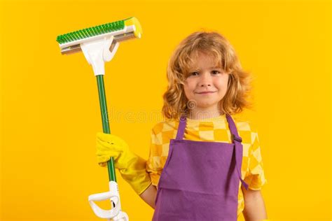 Child Doing Housework Child Use Duster And Gloves For Cleaning Funny