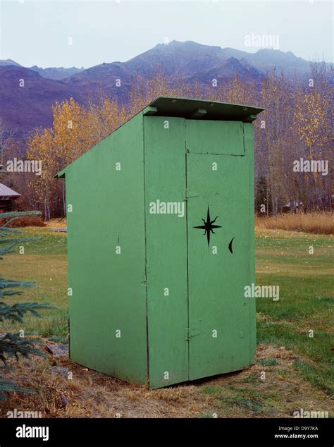 Usa Alaska Wiseman Modern Outhouse With Star And Crescent Moon Stock