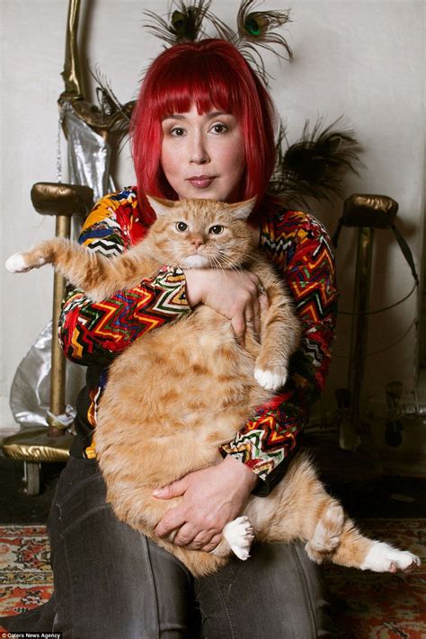 Russian Artist Svetlana Petrova Has Inserted Her Pet A Large Ginger