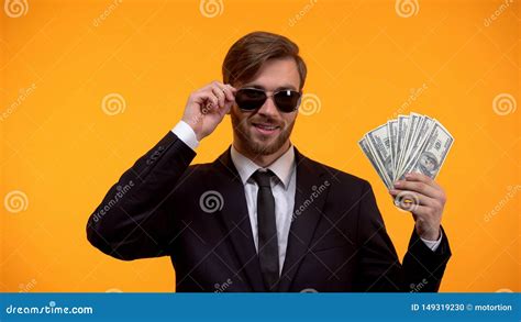 Cool Rich Man In Sunglasses Showing Bunch Of Dollars Lottery Winner