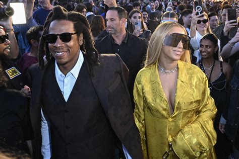 Beyoncé And Jay Z Did His And Hers Suits At Pharrells Louis Vuitton Show