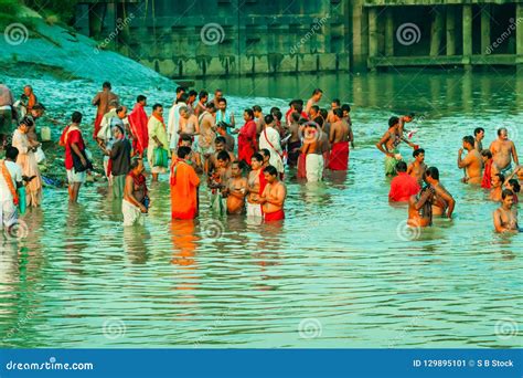 devotees taking holy bath on river ganges editorial photo image of light devotees 129895101
