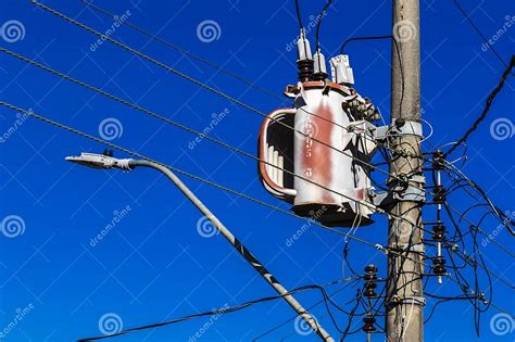 Electric Power Transformer On A Public Lighting Pole Stock Photo