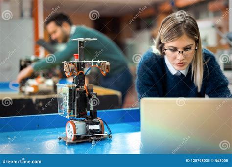 Young Woman Engineer Working On Robotics Project Stock Image Image Of