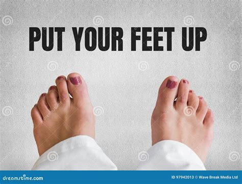 Put Your Feet Up Text And Bare Feet And Grey Stone Background Stock