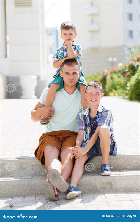 Happy Young Father With His Two Sons Stock Image Image Of Father