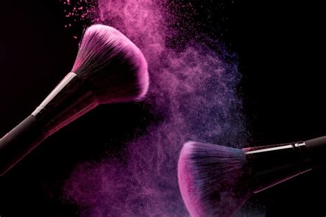Premium Photo Cosmetic Brushes And Makeup Powder On Dark Background