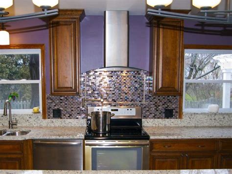 Grey glass kitchen backsplash ideas are good for small kitchens. 10 Beautiful Kitchens with Purple Walls