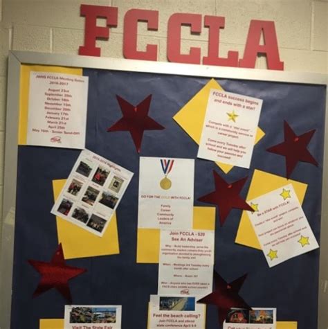 A Bulletin Board With Red And Yellow Stars On It