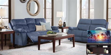 Corinne Blue 8 Pc Living Room With Reclining Sofa Plus 65 In Tv