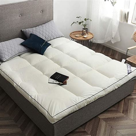 Futon mattresses are known for being downright uncomfortable. XUELIAIKEE Soft Thick Mattress Pad, Foldable Futon ...