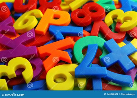 Colorful Plastic Magnetic Letters And Numbers As Background Stock