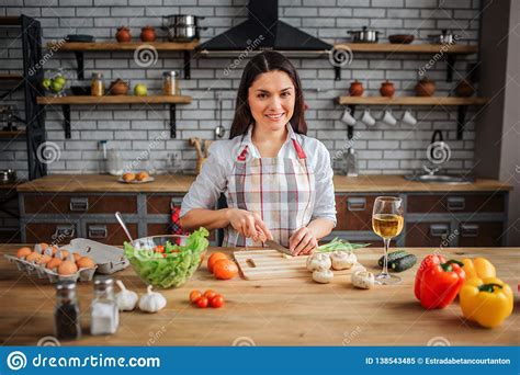 Nice Cheerful Woman Sit At Table In Kitchen She Cooking Woman Look On