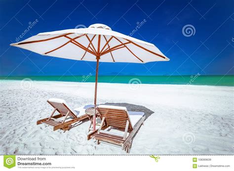 Amazing Tropical Beach With Chairs And Umbrella Stock Image Image Of