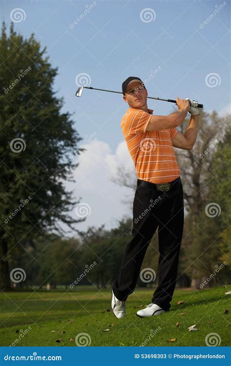 Young Man Swinging Golf Club Stock Image Image Of Person Full 53698303