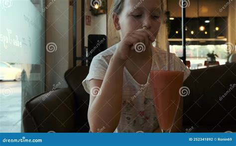 a girl in a cafe with a glass of smoothies stock footage video of girl diet 252341892