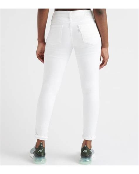 Levis 711 Destructed Skinny Ankle Jeans In White Lyst