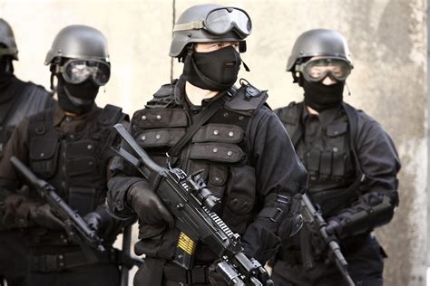 Swat Officer In Full Tactical Gear Criminal Justice Degree Hub