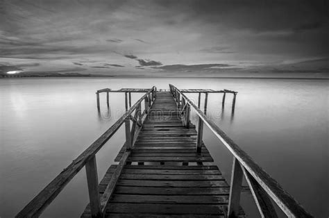Calm Scene In Black And White With Abandoned Jetty At Teluk Tempoyak