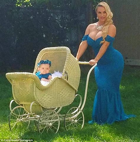 Coco Austin Shows Off Her Figure And Cleavage In A Gown As She Pushes