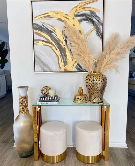 Gold Decor And Feather Arrangement In Vase In 2021 Wine Cabinet Decor