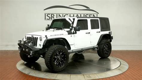 2014 Jeep Wrangler Unlimited Rubicon In Bright White Clearcoat 306237