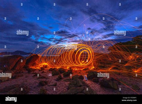 Cool Burning Steel Wool Fire Work Photo Experiments On The Rock At