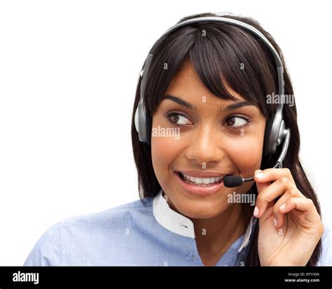 Attractive Ethnic Customer Service Representative Using Headset Stock