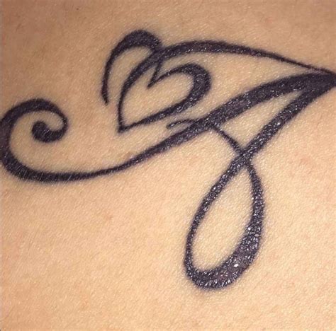Letter A With Heart Tattoo Designs On Hand Connors Antence