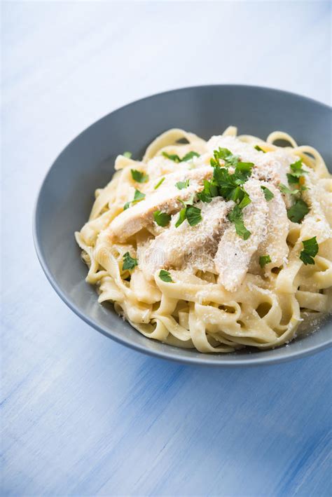 Pasta Fettuccine Alfredo With Chicken Parmesan And