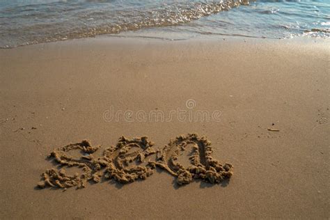 Vacation On The Sand Beach Concept Sea Words Written Into The Sand On The Beach Stock Image