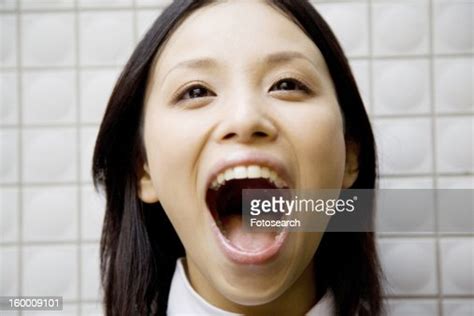 Portrait Of Young Woman Yelling High Res Stock Photo Getty Images