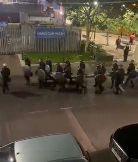 Riot Police Flood Streets After Cops Hampered While Helping Gunshot Victim The World Other Side