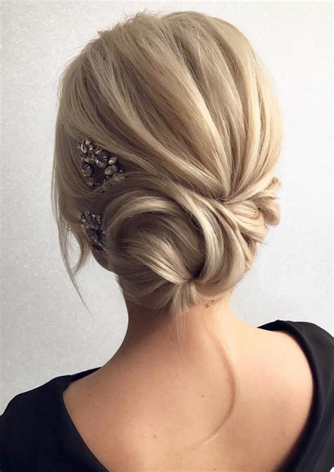 Shave the sides and ask for a line on each one. 12 So Pretty Updo Wedding Hairstyles from TonyaPushkareva ...