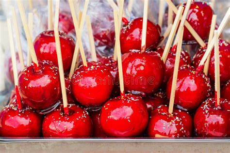 Sweet Glazed Red Toffee Candy Apples On Sticks Stock Photo Image Of