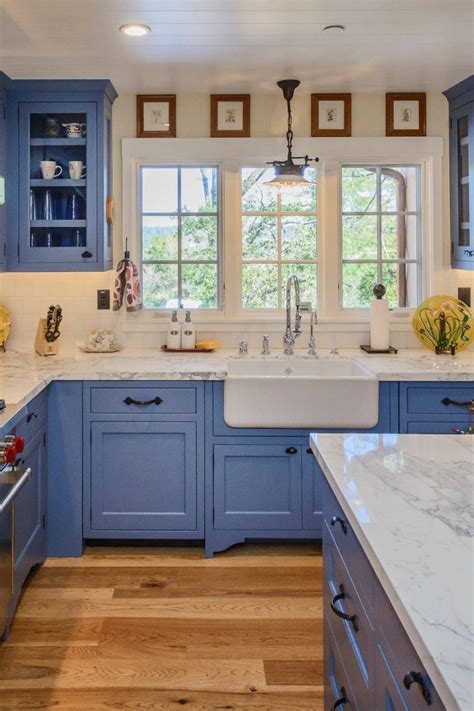 Kitchen With Blue Cabinets And White Counters Image To U