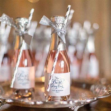 Mini Bottles Of Pink Champagne For Unique Wedding Favors That Guests Will Love Photo By