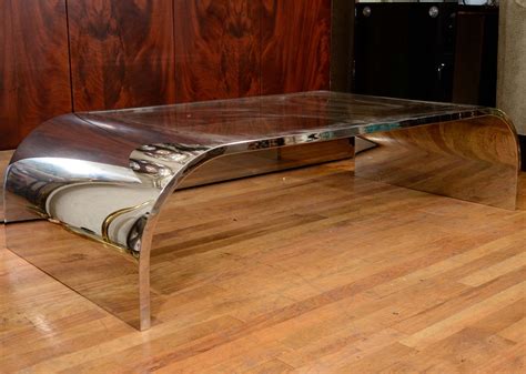 For our extra large art & home items such as furniture and area rugs, we provide a white glove delivery service which includes. Chrome Waterfall Coffee Table By Pace at 1stdibs