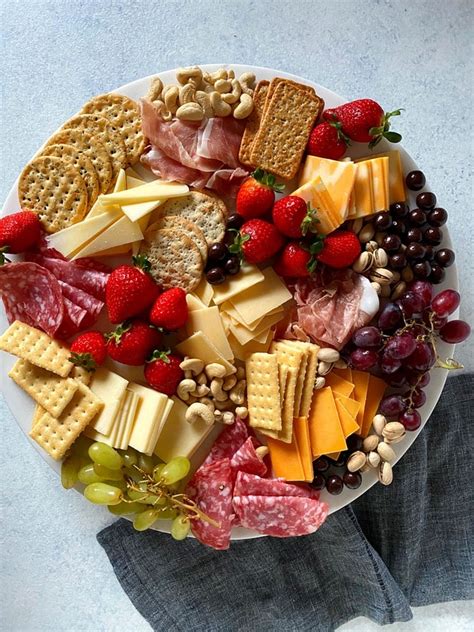 13 x 13 x 2 inch wood charcuterie platter for wine, cheese, meat 4.8 out of 5 stars 4,750 #1 best seller in cheese servers How to Build a Meat and Cheese Board with Cabot + Giveaway ...