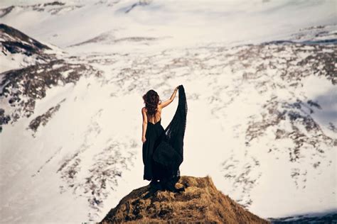 3840x2160 Resolution Woman Stand On Brown Rock Cliff Wearing Black