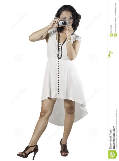 However my mother has curly hair (think loose ringlets) and so do all her siblings. Curly-haired Asian Woman Operating A Pocket Camera. Stock ...