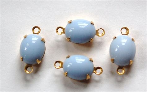 Vintage Opaque Light Blue Oval Stones In 2 Loop Brass Setting