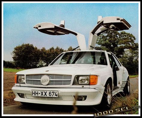 Popular garage door styles range from carriage house to modern. Mercedes Benz 500SGS Gullwing (W126) by Styling Garage