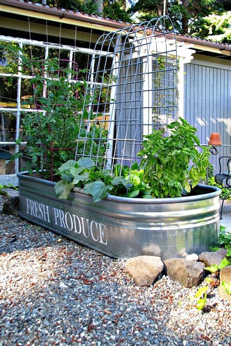 16 creative ways to transform your home and backyard with stock tanks raised vegetable gardens