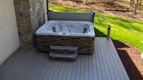 don t you just love the stone surround on this new hot spring grandee installed by atlantic