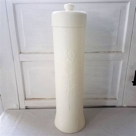 The reserve toilet tissue holder is designed to ensure that toilet paper stays off bathroom floors so rolls are always clean, dry and ready to use. Rose Floral Breamco White Plastic Standing Toilet Paper ...