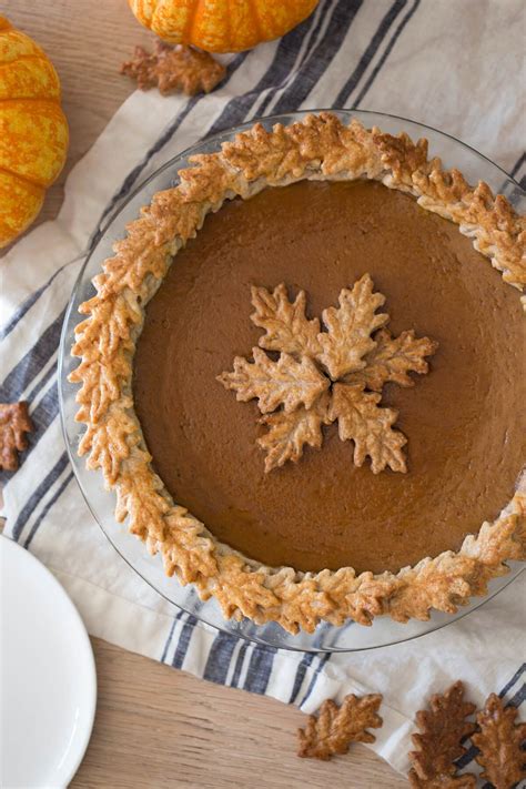 A Photo Of Pumpkin Pie With Leaves Made Out Of Pie Crust Decorated On