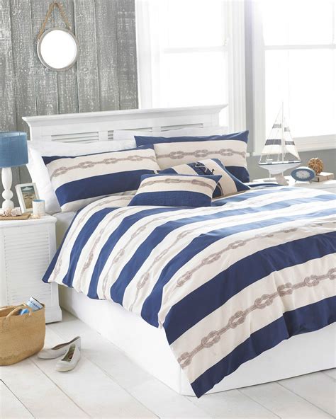 A coastal bedroom just isn't complete without some fabulous coastal bedding, right? Nautical Theme Striped Duvet Cove Set Navy Blue & Beige ...